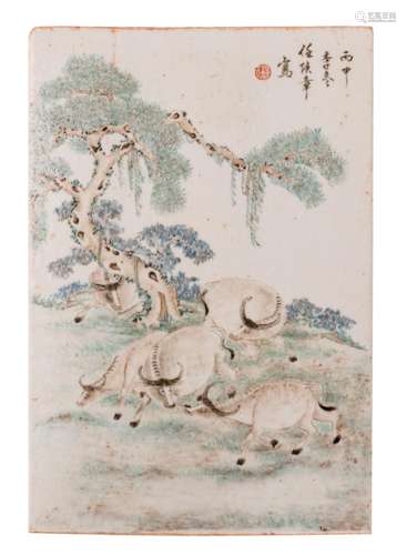 A Chinese polychrome decorated plaque with water buffalos in a landscape and calligraphic texts, marked, H 38,5 - W 26 cm