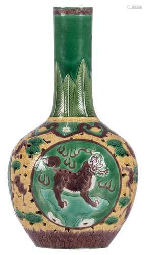 A Chinese double walled bottle shaped sancai vase, openwork and relief decorated with Fu lions, bats and floral motifs, with a Qianlong mark, H 34 cm