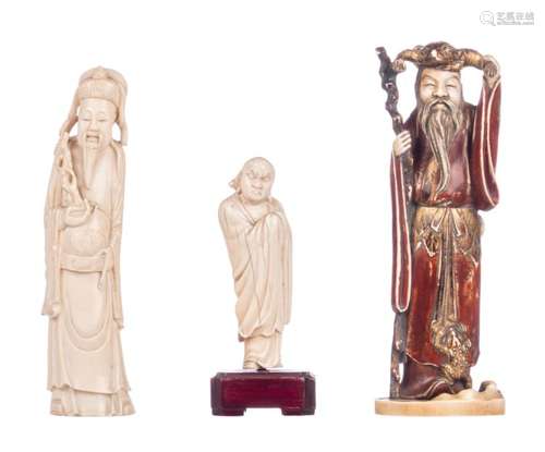 Three Chinese ivory figures depicting a sage, H 10,6 without - 12,7 cm with base - Weight: 111g; added a Lu Xing figure, H 17,1 cm - Weight: 168g; extra added a polychrome decorated mythical figure, H 18,4 cm - Weight: 358g, all items late 19th - early 20thC