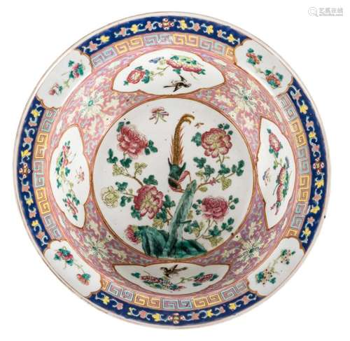 A Chinese famille rose decorated bowl, the roundels with birds and flower branches, 19thC, H 14 - ø 41 cm