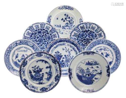 Two Chinese blue and white lotus moulded floral decorated dishes, with a symbol mark, Kangxi and period; added six Chinese blue and white dishes, 18thC, ø 22-23 cm