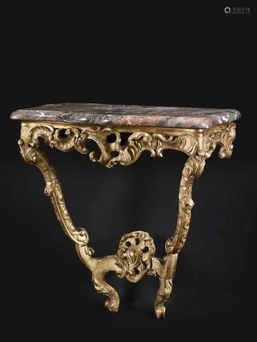 CONSOLE D'ÉPOQUE LOUIS XV En bois sculpté et doré, dessus de marbre des Flandres associé, la