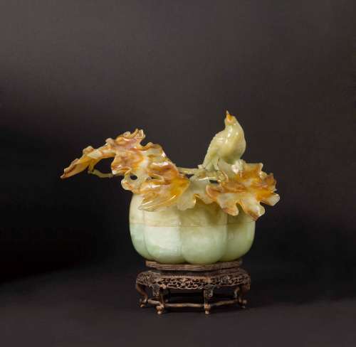 A yellow and russet jade box and cover with branch and bird  ...