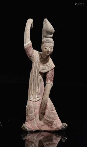 A painted pottery figure of a dancer, China, Tang Dynasty  ...
