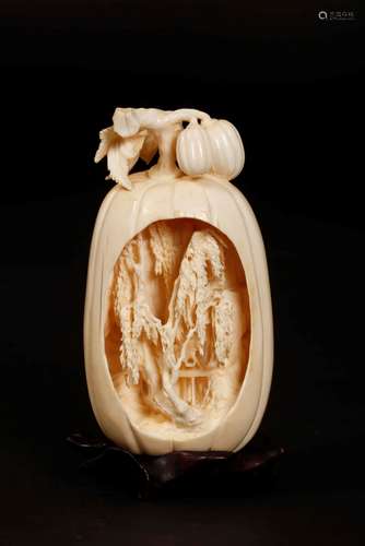 A carved ivory pumpkin, China, Qing Dynasty, 19th century