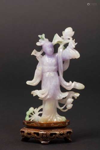 A small lavander shades jadeite figure of Guanyin, China,  ...