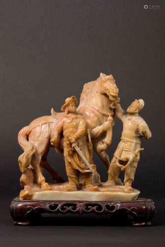 A soapstone horse and horsemen group, China, early 20th ce ...