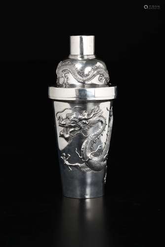 A silver shaker with dragons in relief, China, Qing Dynasty,  ...