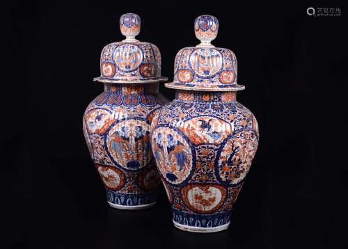 A pair of large Imari porcelain potiches and cover, Japan,  ...