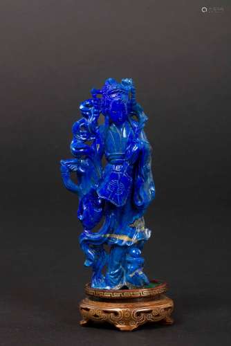 A small lapis lazuli figure of Guanyin with fan, China, early  ...