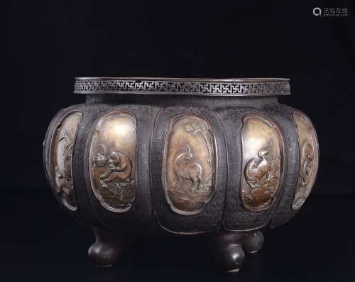 A large bronze cachepot with animals within reserves, Japan,  ...