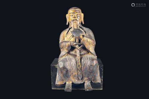 A semi-gilt bronze figure of dignitary with ruyi, China, Ming  ...