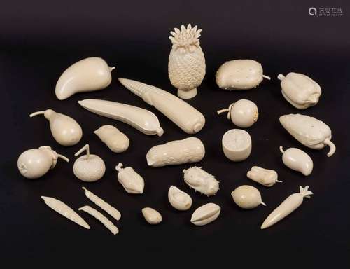 Twenty-six carved ivory fruits, China, early 20th century