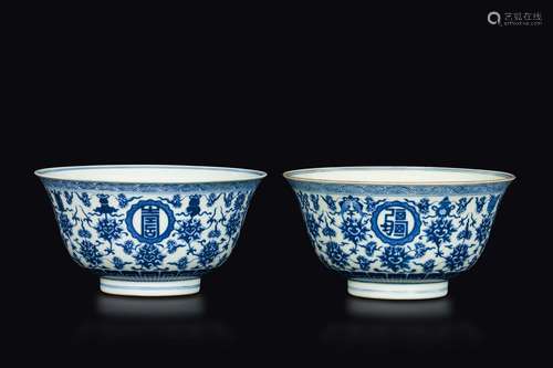 A pair of blue and white bowls with four ruyi-bordered roundels  ...