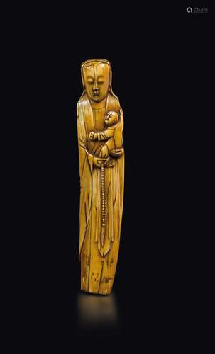 A carved ivory figure of woman with child, China, Ming Dynasty,  ...