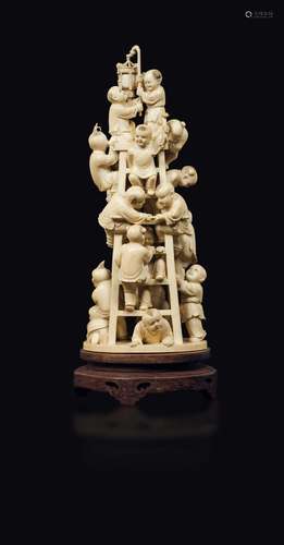 A carved ivory playing children group, China, early 20th c ...