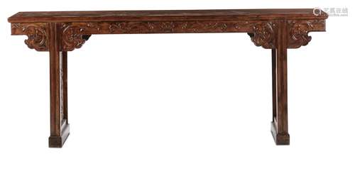 An important huanghuali recessed-leg table with openwork sides  ...