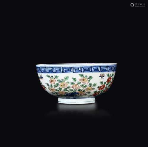 A polychrome enamelled porcelain bowl with floral decoration  ...