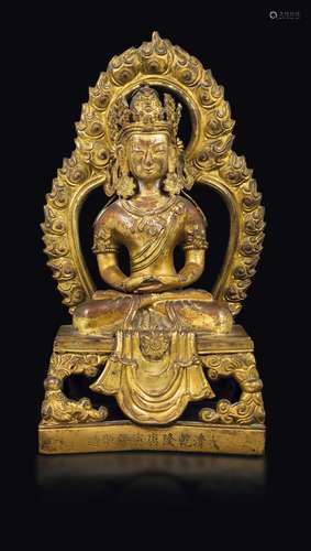 A gilt bronze figure of Amitayus with aura, China, Qing Dynasty,  ...