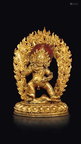 A gilt bronze figure of EkaviraMahakala with aura, Tibet,  ...