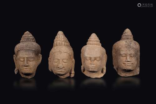 Four stone Buddha's heads, Khmer, 13th century