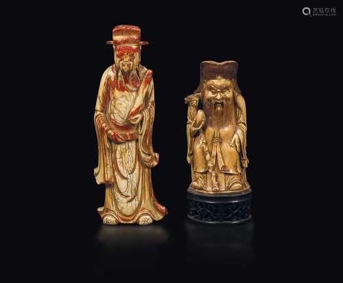 Two semi-gilt and painted carved ivory figures of dignitaries,  ...