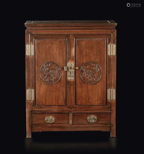 A homu wooden cabinet with small dragons, China, Qing Dynasty,  ...