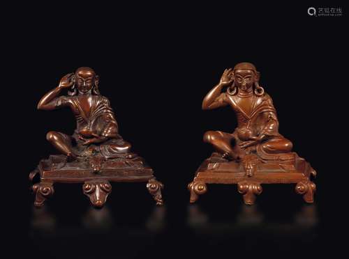 Two burnished bronze figure of monks with atra, China, Qing  ...