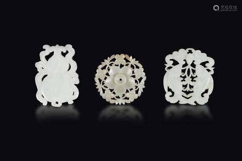 Three white jade plaques, one with two fish, one double-pumpkin  ...