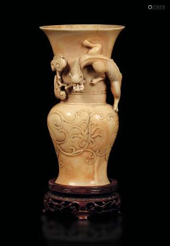 A carved ivory vase with fantastic animal in relief, China,  ...