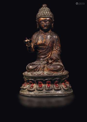 A semi-gilt bronze figure of Buddha on a double lotus flower,  ...