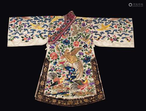 A silk flowers-ground dress embroidered with roosters, cranes  ...