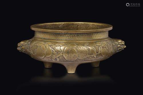 A gilt bronze censer with mask handles, China, Qing Dynasty,  ...