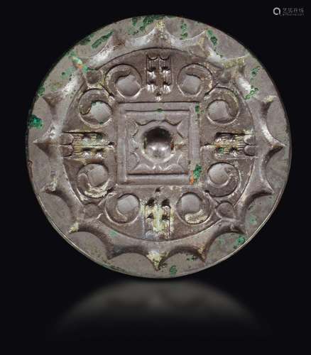 A bronze Bo Ju mirror with central boss, China, Han Dynasty  ...