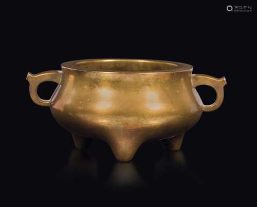 A gilt bronze tripod censer with handles, China, Qing Dynasty,  ...