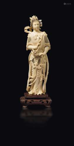 A carved ivory figure of warrior Guanyin with a sword, China,  ...