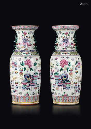 A pair of polychrome enamelled porcelain vases with naturalistic  ...