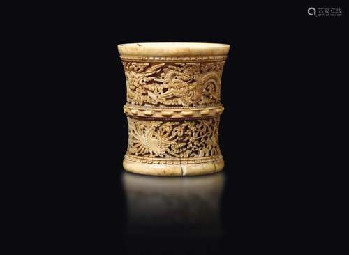 A carved ivory brushpot with dragons and phoenixes, China,  ...