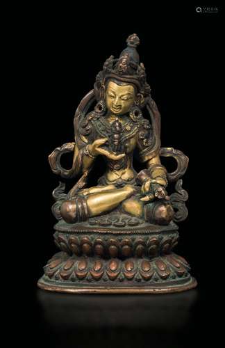 A burnished and gilt bronze figure of Amitayus with dorje  ...