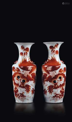 A pair of polychrome enamelled porcelain vases with Pho dogs  ...