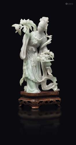 A jadeite figure of Guanyin with flowers, China, 20th cent ...