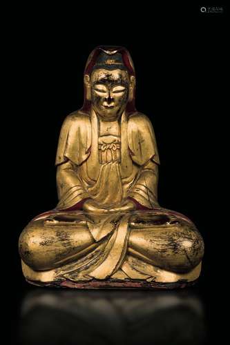 A gilt and lacquered wooden figure of Buddha, South-est As ...