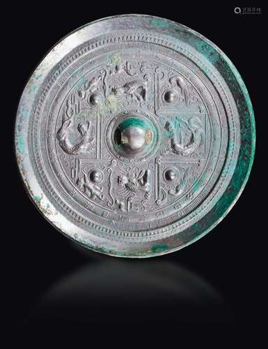 A bronze Bo Ju mirror with central boss, China, Han Dynasty  ...