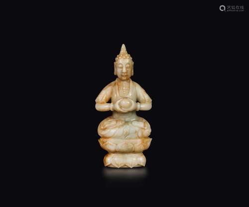 A white and russet jade figure of Buddha seated on a double  ...