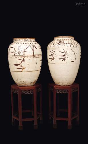 A large pair of Chizou sgraffiato ovoid vases with wooden  ...
