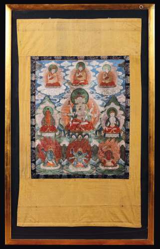 A framed silk tanka with a figure of Ushnishavijaya and nine  ...