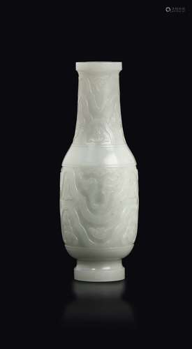 A small white jade vase with an archaic style motif, China,  ...