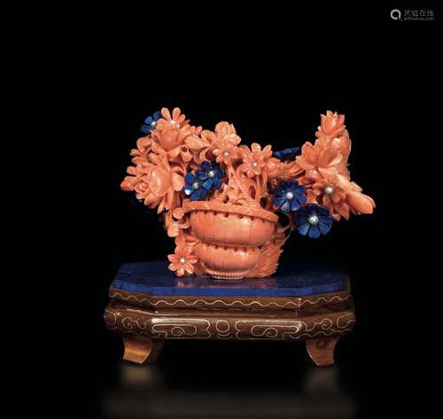 A small carved coral and lapis lazuli vase with flower, China,  ...