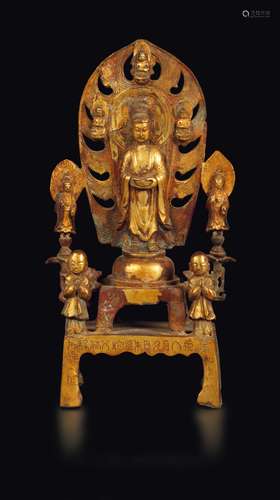 A gilt bronze group of Buddha Sakyamuni with attendants and  ...