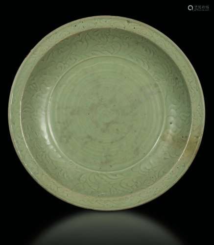 A large Longquan Celadon dish with naturalistic decoration,  ...